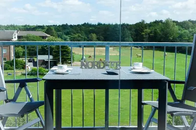 Ein Balkon oder eine Terrasse in der Unterkunft Haus Hohe Geest HG25