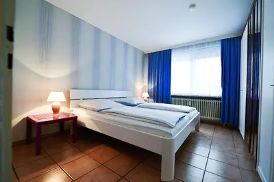 Ein Bett oder Betten in einem Zimmer der Unterkunft Haus Heidhöhn Nr 4 HE04