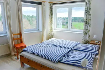 Ein Bett oder Betten in einem Zimmer der Unterkunft Haus Nordseebrandung NA44