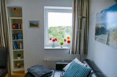 Ein Sitzbereich in der Unterkunft Haus Nordseebrandung NA63