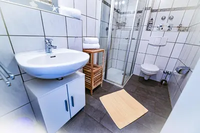Ein Badezimmer in der Unterkunft Haus Nordseebrandung NB16