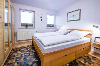 Ein Bett oder Betten in einem Zimmer der Unterkunft Haus Nordseebrandung NA71