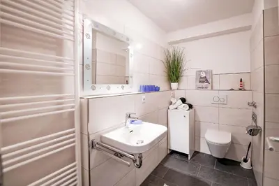 Ein Badezimmer in der Unterkunft Haus Nordseebrandung NA72
