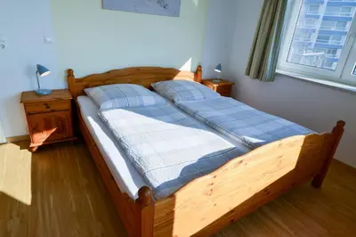 Ein Bett oder Betten in einem Zimmer der Unterkunft Haus Nordseebrandung ND44
