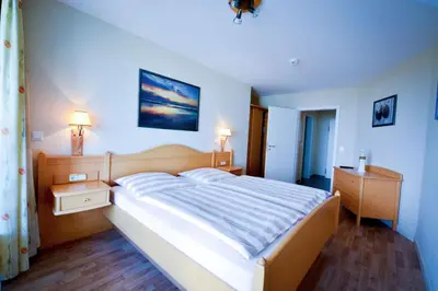 Ein Bett oder Betten in einem Zimmer der Unterkunft Haus Nordseebrandung ND63