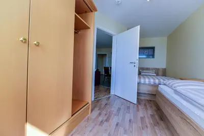 Ein Bett oder Betten in einem Zimmer der Unterkunft Haus Nordseebrandung ND63