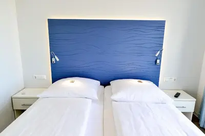 Ein Bett oder Betten in einem Zimmer der Unterkunft Beach Lodge BL03