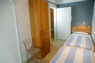 Ein Bett oder Betten in einem Zimmer der Unterkunft Haus Nordseebrandung NC21