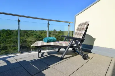 Ein Balkon oder eine Terrasse in der Unterkunft Haus Nordseebrandung NC75