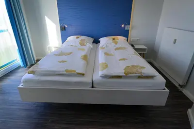 Ein Bett oder Betten in einem Zimmer der Unterkunft Beach Lodge BL08