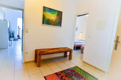 Ein Bett oder Betten in einem Zimmer der Unterkunft Strandhochhaus SJ03