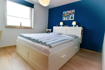 Ein Bett oder Betten in einem Zimmer der Unterkunft Haus Horizont HZ25