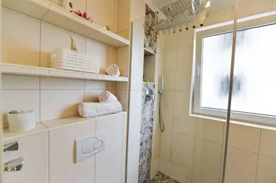 Ein Badezimmer in der Unterkunft Strandhochhaus SA10