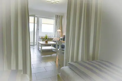 Ein Sitzbereich in der Unterkunft Strandhochhaus SHB1