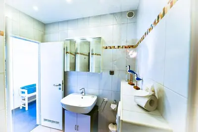 Ein Badezimmer in der Unterkunft Strandhochhaus SD09