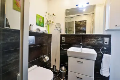 Ein Badezimmer in der Unterkunft Strandhochhaus SF10