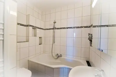 Ein Badezimmer in der Unterkunft Strandhochhaus SF14
