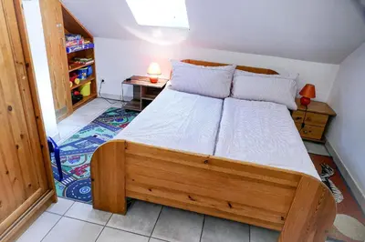 Ein Bett oder Betten in einem Zimmer der Unterkunft Haus Horizont H14B