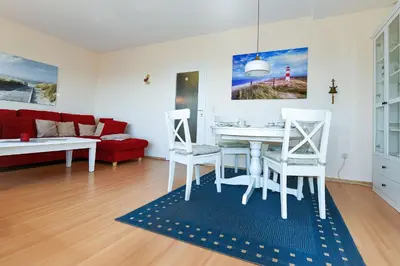 Ein Sitzbereich in der Unterkunft Strandhochhaus SD02