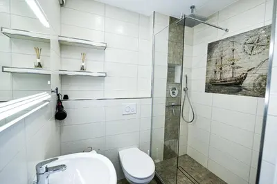 Ein Badezimmer in der Unterkunft Strandhochhaus SD02