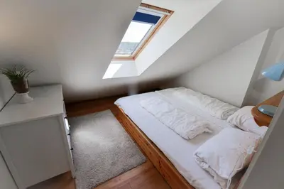 Ein Bett oder Betten in einem Zimmer der Unterkunft Haus Horizont HZ10