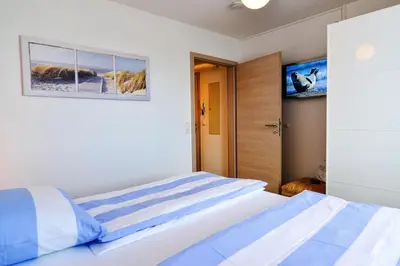 Ein Bett oder Betten in einem Zimmer der Unterkunft Haus Horizont HZ13
