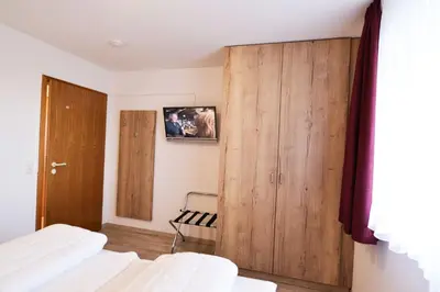 Ein Bett oder Betten in einem Zimmer der Unterkunft Haus Horizont HZ19