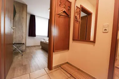 Ein Bett oder Betten in einem Zimmer der Unterkunft Haus Horizont HZ19