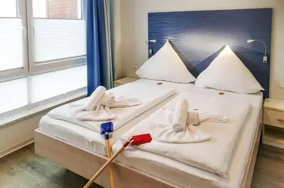 Ein Bett oder Betten in einem Zimmer der Unterkunft Beach Lodge BL01