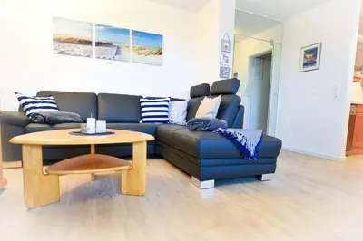 Ein Sitzbereich in der Unterkunft Haus Nordseebrandung NB62