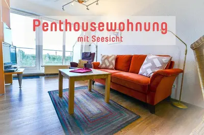 Ein Sitzbereich in der Unterkunft Haus Nordseebrandung NB71
