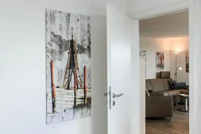 Ein Sitzbereich in der Unterkunft Haus Nordseebrandung NA55