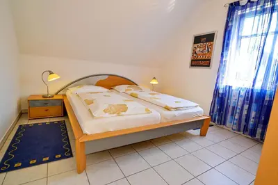 Ein Bett oder Betten in einem Zimmer der Unterkunft Flockengrund HB09