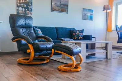 Ein Sitzbereich in der Unterkunft Haus Nordseebrandung NC54