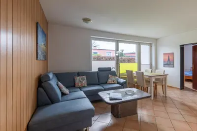 Ein Sitzbereich in der Unterkunft Haus Windböe, Wohnung 2