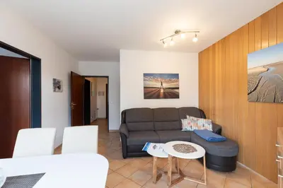 Ein Sitzbereich in der Unterkunft Haus Windböe, Wohnung 3