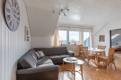 Ein Sitzbereich in der Unterkunft Haus Windböe, Wohnung 6