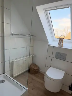 Ein Badezimmer in der Unterkunft Deich Winde 9.1