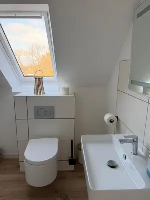 Ein Badezimmer in der Unterkunft Deich Winde 9.1