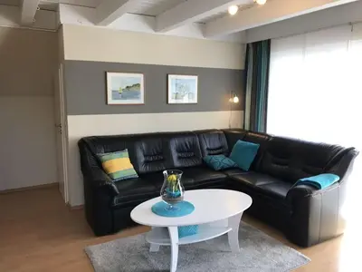 Ein Sitzbereich in der Unterkunft Ferienhaus „Buß“