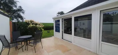 Ein Balkon oder eine Terrasse in der Unterkunft Ferienhaus Frische Brise direkt am Nordsee Deich