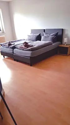 Ein Bett oder Betten in einem Zimmer der Unterkunft Dithmarscher Haus