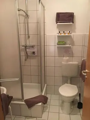 Ein Badezimmer in der Unterkunft Dithmarscher Haus