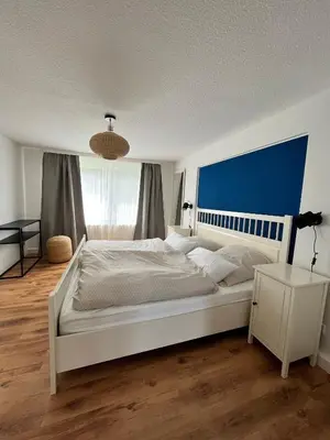 Ein Bett oder Betten in einem Zimmer der Unterkunft Padingbude
