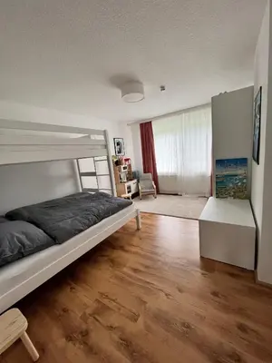 Ein Bett oder Betten in einem Zimmer der Unterkunft Padingbude