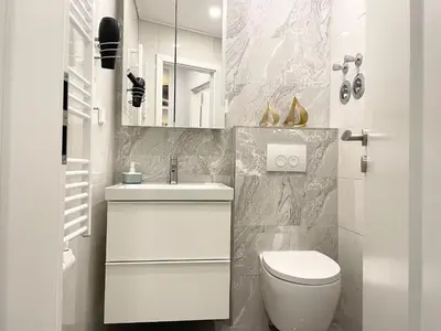 Ein Badezimmer in der Unterkunft Meeresbrandung 37
