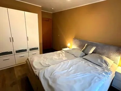 Ein Bett oder Betten in einem Zimmer der Unterkunft Residenz Haus am Mühlenpark