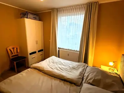 Ein Bett oder Betten in einem Zimmer der Unterkunft Residenz Haus am Mühlenpark