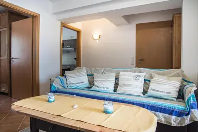 Ein Sitzbereich in der Unterkunft Neue Reihe 8 Wohnung links