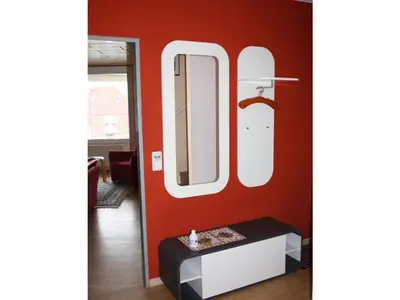 Ein Bett oder Betten in einem Zimmer der Unterkunft Meerblick 424 im Haus Trafalgar